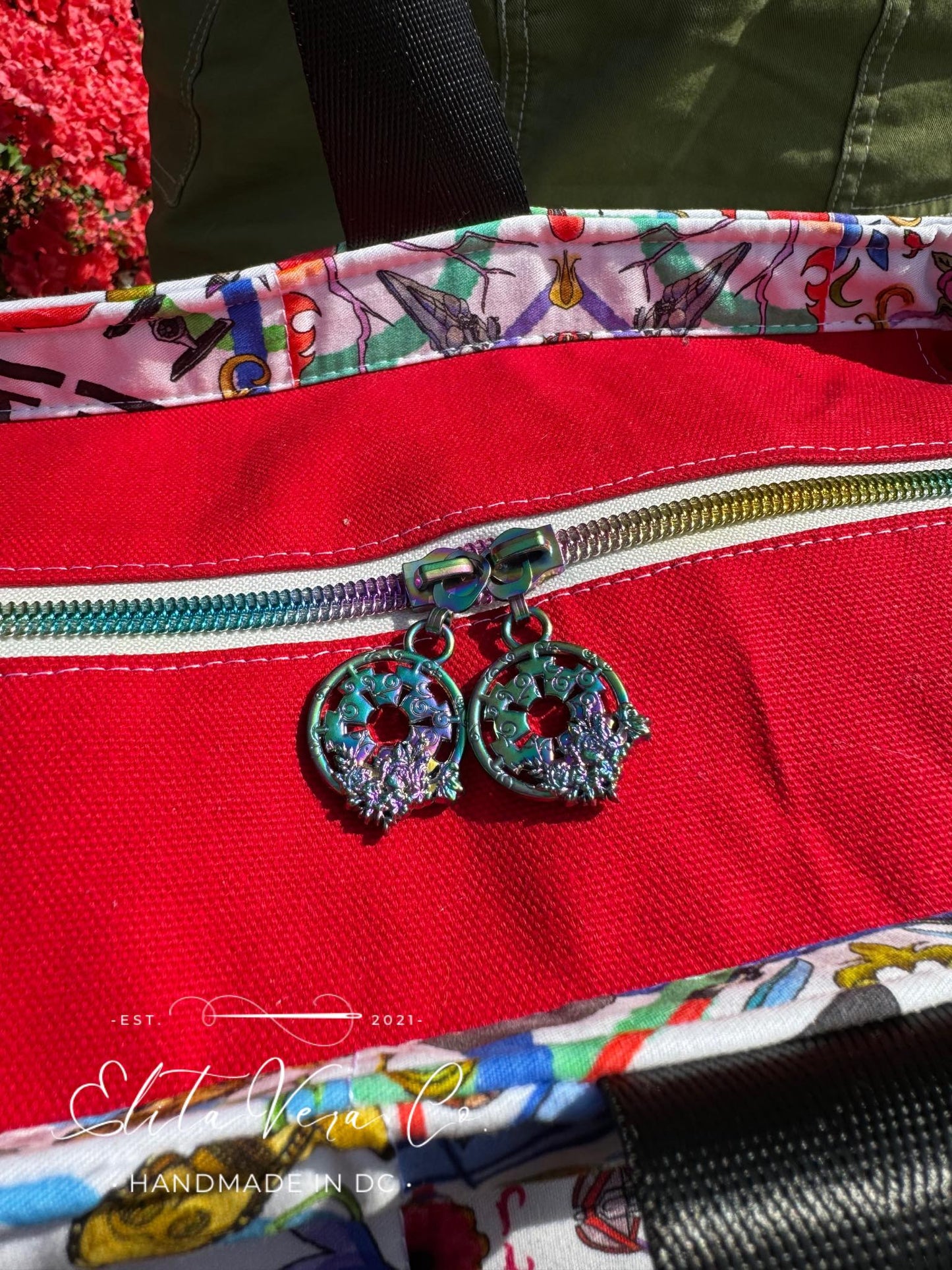 *RETAIL* Floral E Symbol Zipper Pulls