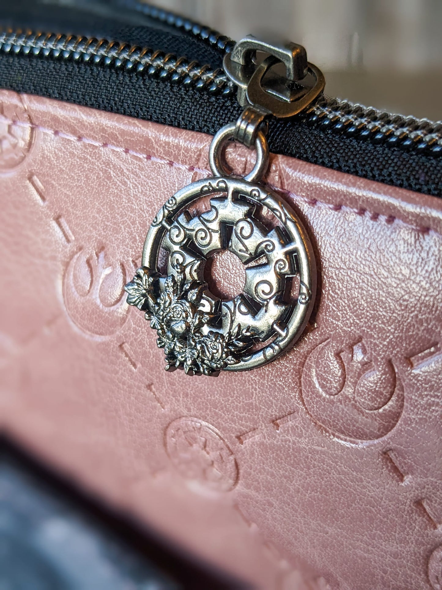 *RETAIL* Floral E Symbol Zipper Pulls