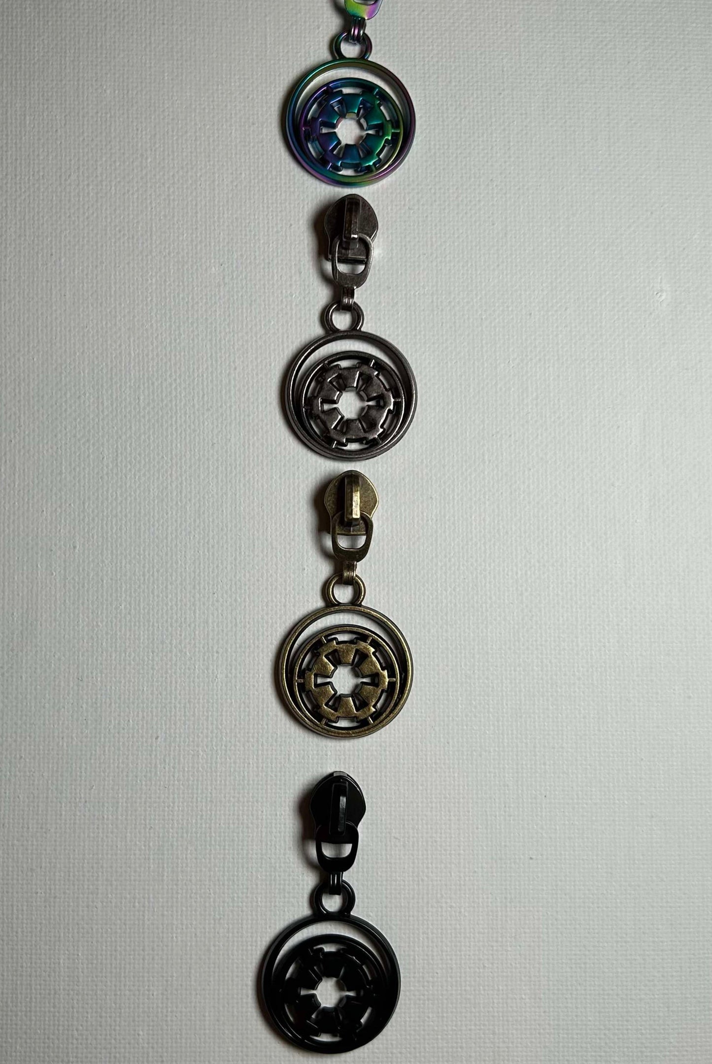 *RETAIL* EMP Zipper Pulls