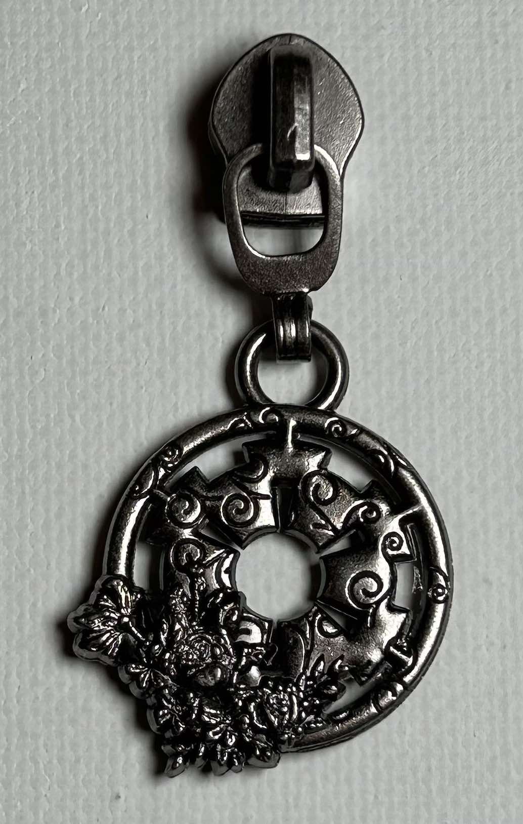*RETAIL* Floral E Symbol Zipper Pulls