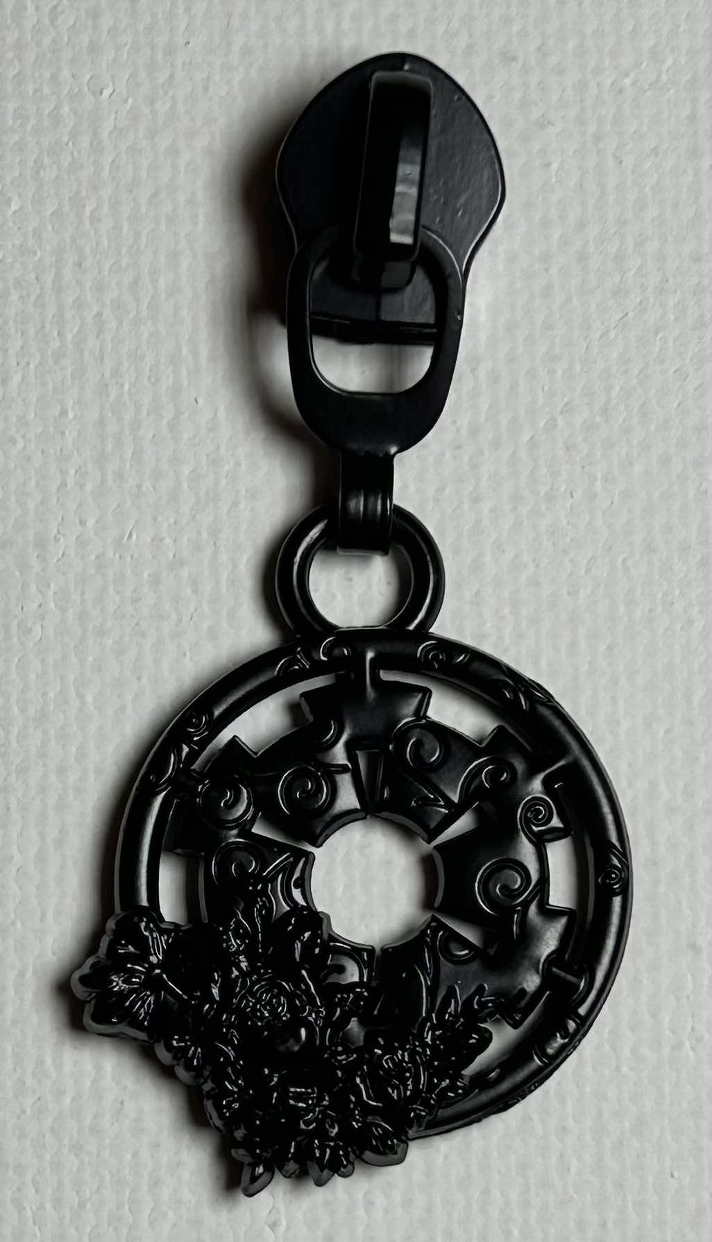 *RETAIL* Floral E Symbol Zipper Pulls