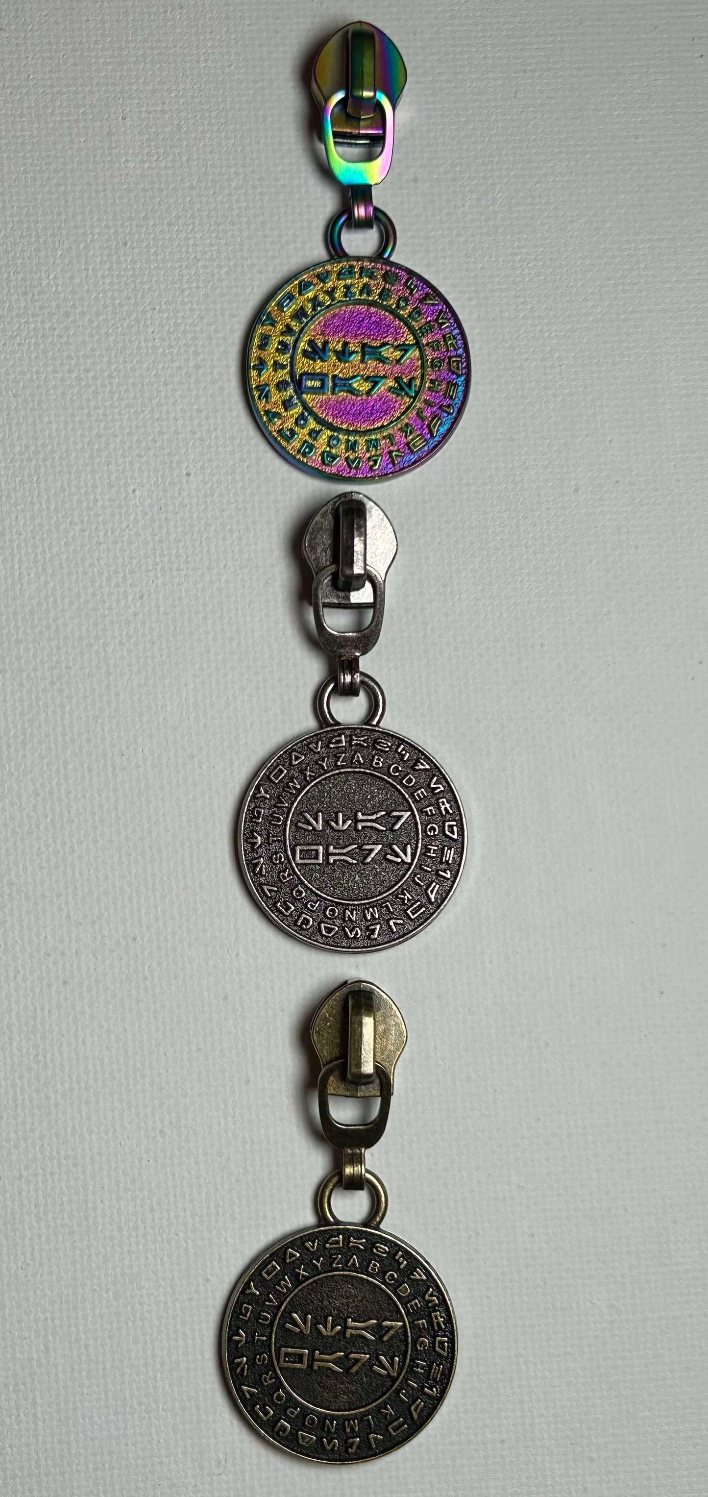 *RETAIL* SW Language Translator Zipper Pull