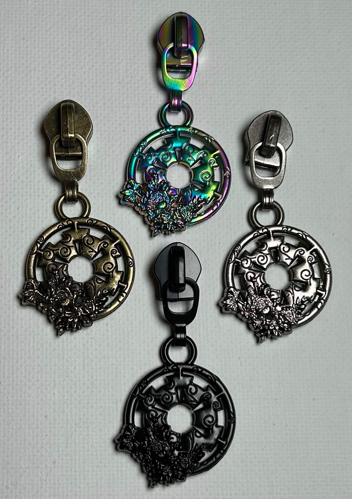 *RETAIL* Floral E Symbol  Zipper Pulls